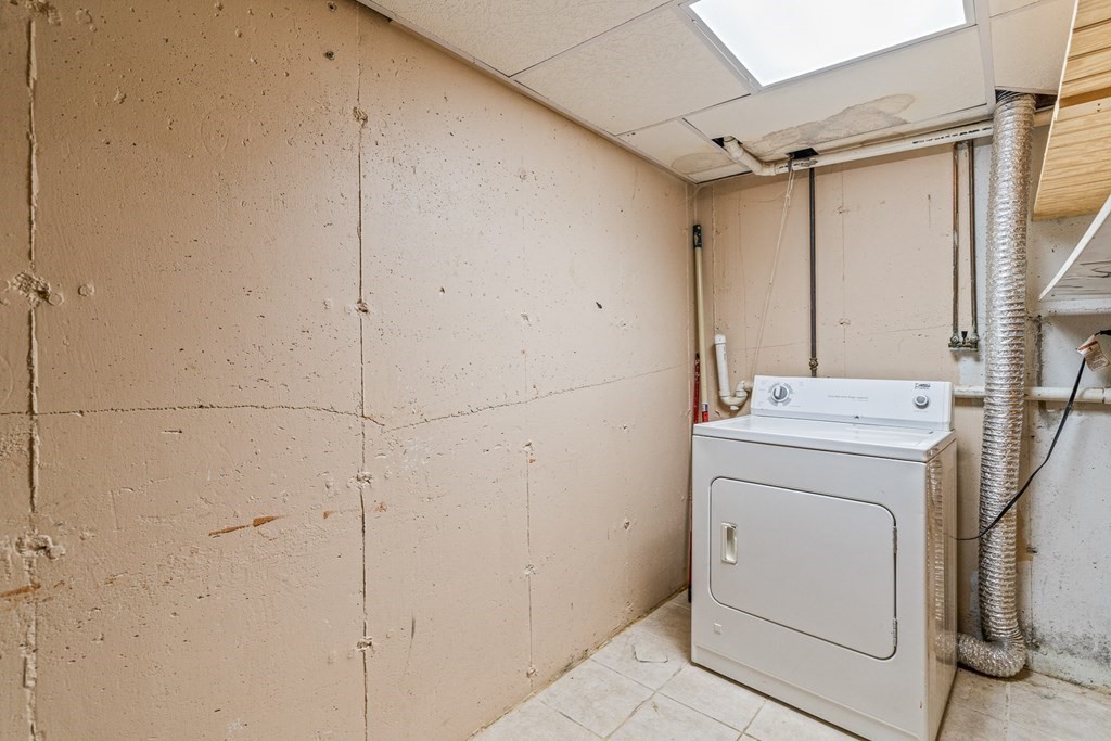 23 Heard Street, Unit 23 Chelsea, MA 02150 - Photo 21 of 27 a utility room with dryer and washer