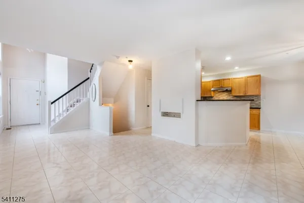 a view of a kitchen with a sink