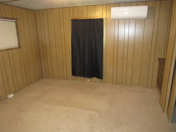 a bathroom with a sink vanity mirror and toilet