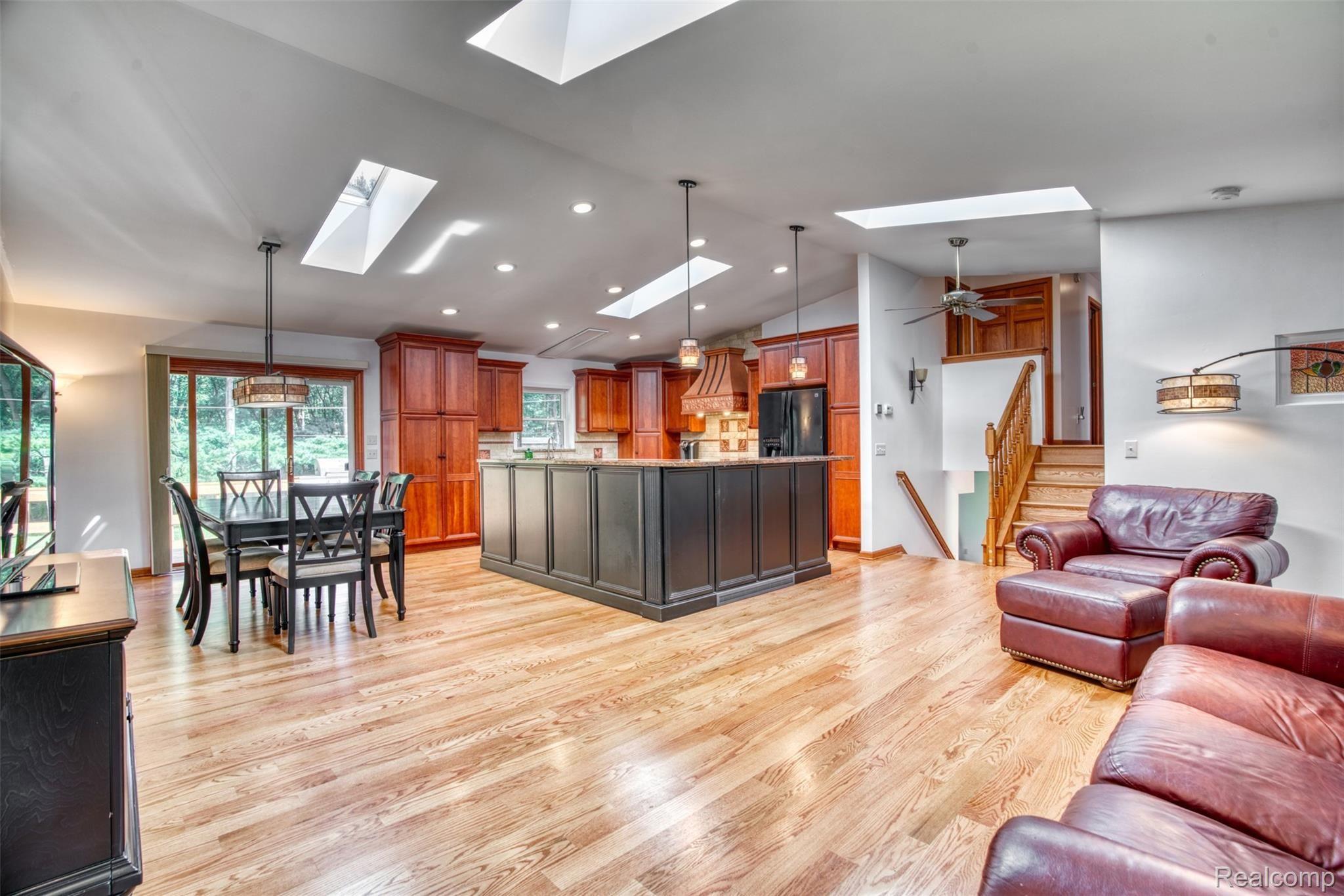 11813 Newman Road Brighton, MI 48114 - Photo 11 of 33 Living and dining rms open to remodeled kitchen