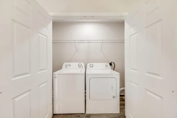 a utility room with dryer and washer