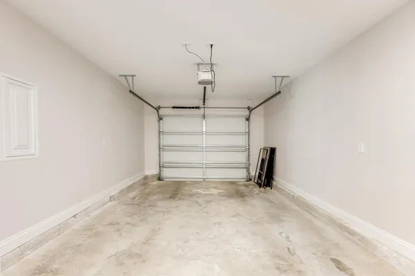 a view of a room with a white walls