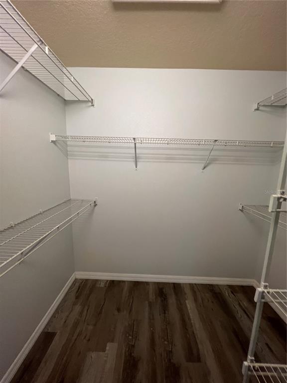 99 Flanders Street Port Charlotte, FL 33954 - Photo 23 of 29 a view of a room with racks on the wall