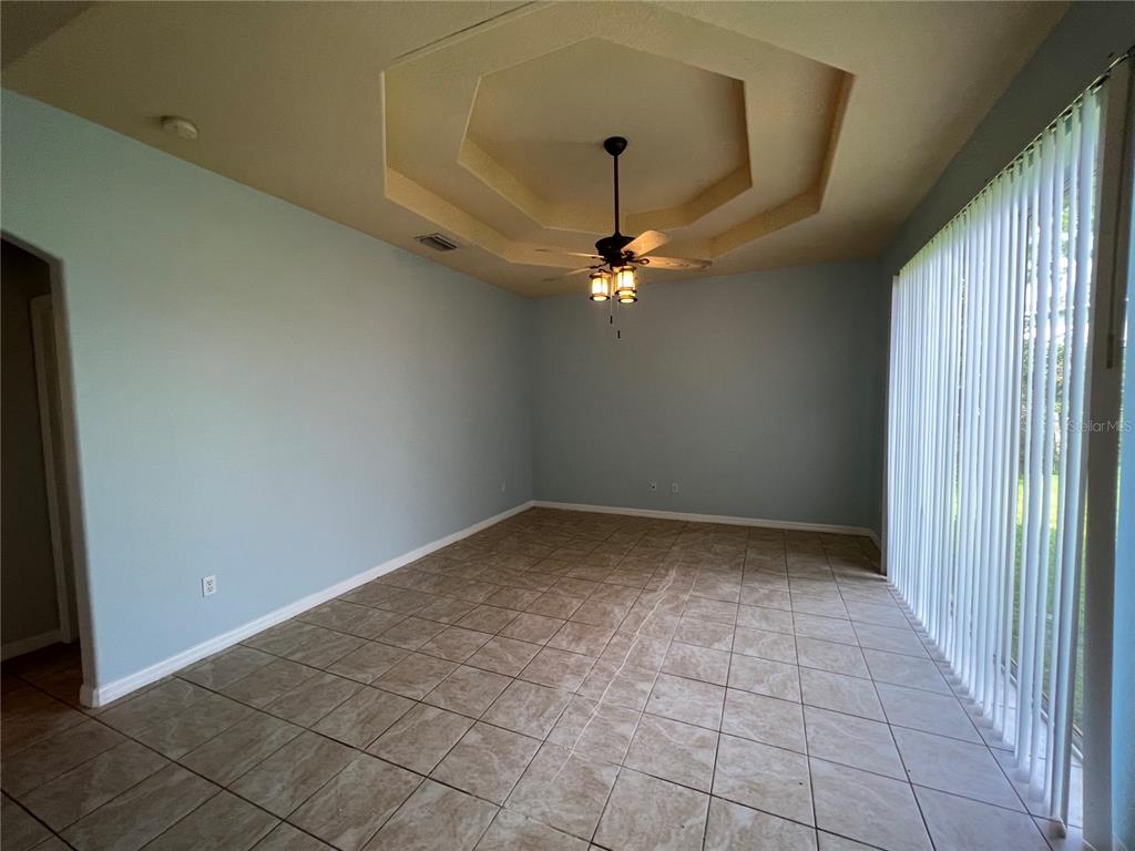 99 Flanders Street Port Charlotte, FL 33954 - Photo 10 of 29 a view of an empty room with a window