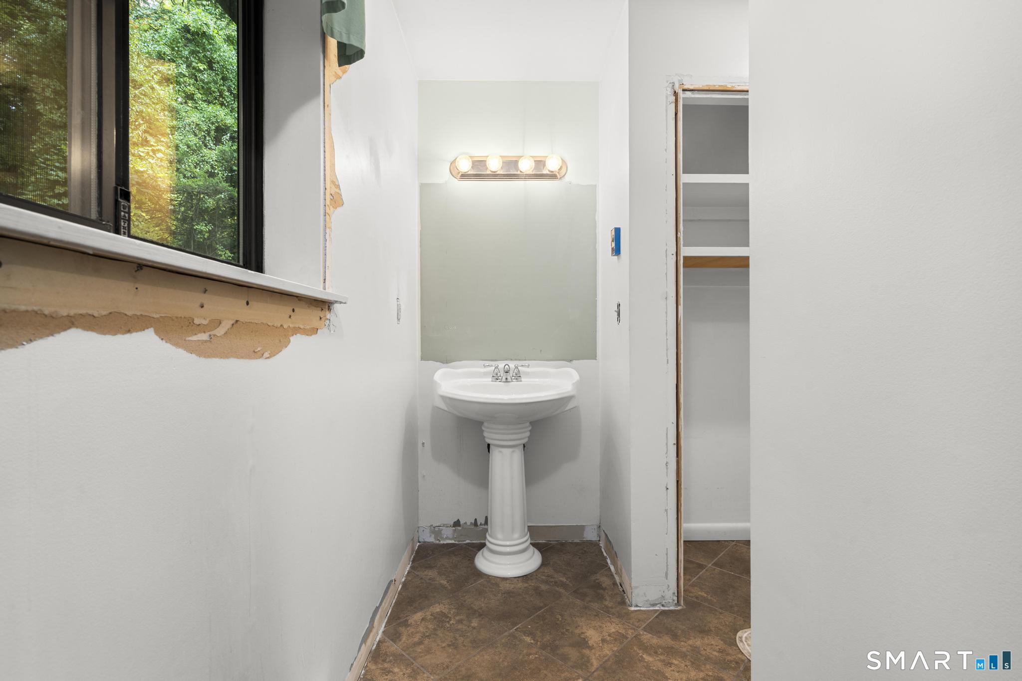 292 Branch Road Thomaston, CT 06787 - Photo 24 of 32 2nd Full Bath on upper floor in need of mirror and trim.