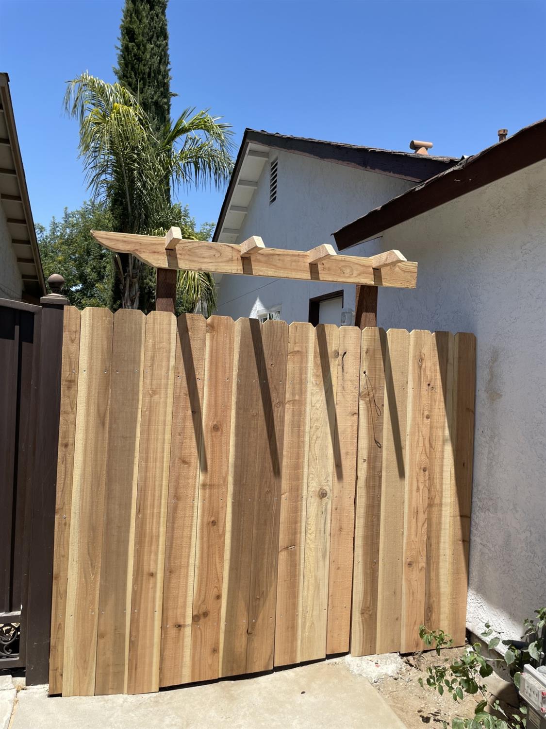 605 El Monte Street Madera, CA 93637 - Photo 15 of 17 a view of outdoor space with a wooden door