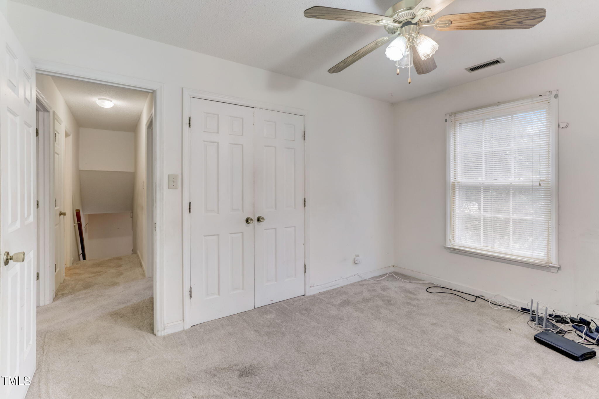5502 Russell Road Durham, NC 27712 - Photo 19 of 31 a view of an empty room and a window