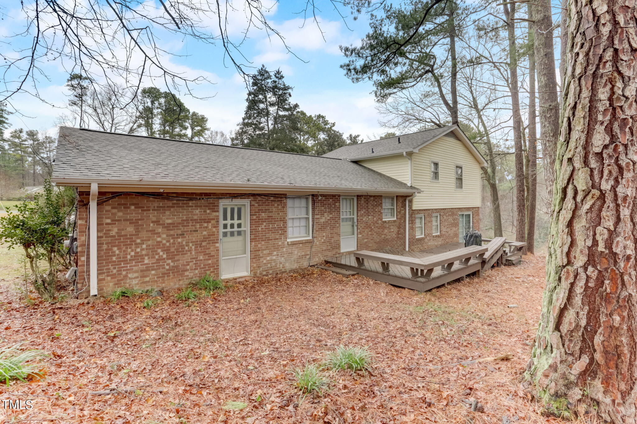 5502 Russell Road Durham, NC 27712 - Photo 29 of 31 a view of a house with a yard