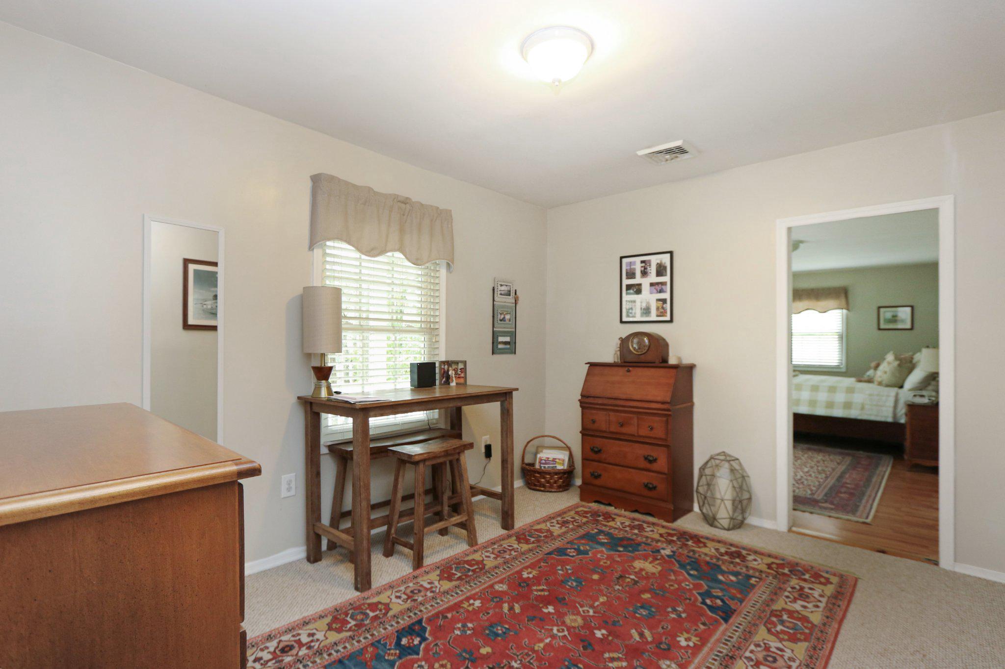 13431 Solitude Trail Machipongo, VA 23405 - Photo 29 of 32 Cozy room with warm, inviting tones.