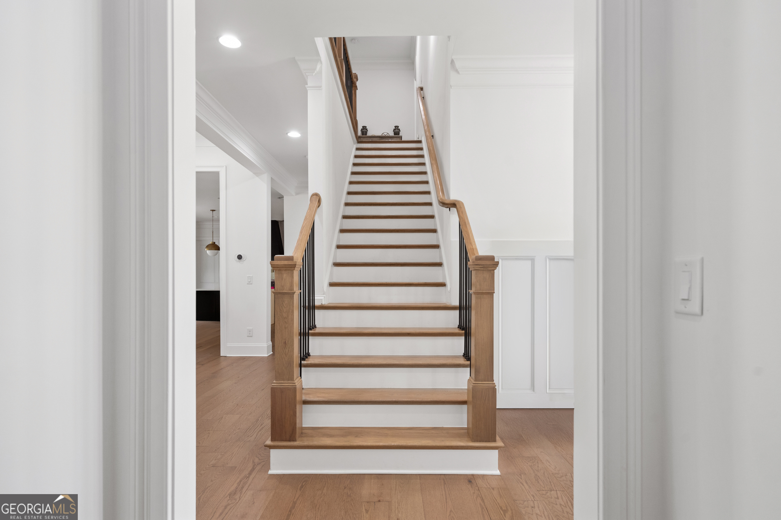 2045 Kent Court Milton, GA 30004 - Photo 19 of 104 a view of entryway with stairs and wooden floor