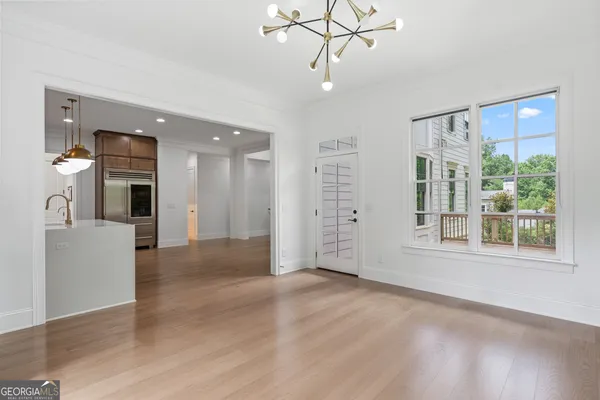 an empty room with a large window