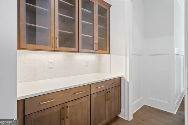 a white bath tub sitting next to a window