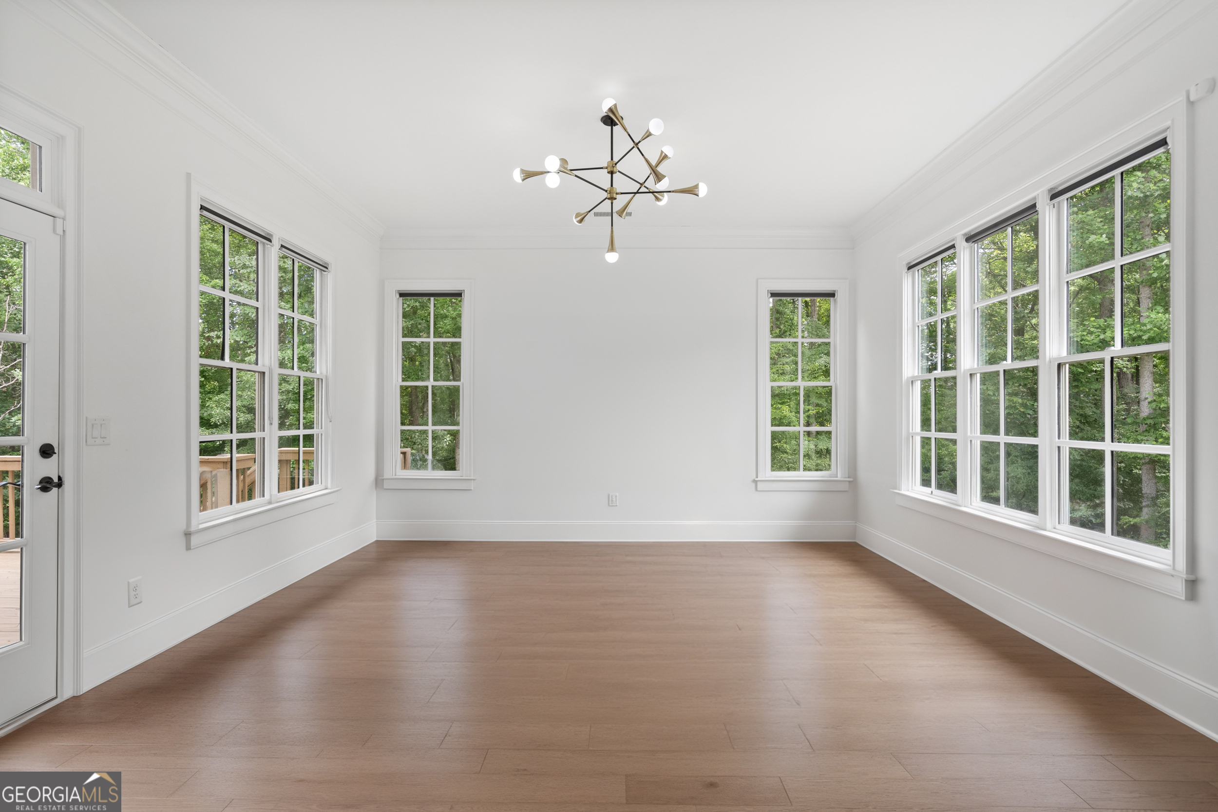 2045 Kent Court Milton, GA 30004 - Photo 40 of 104 a view of wooden floor and windows in an empty room