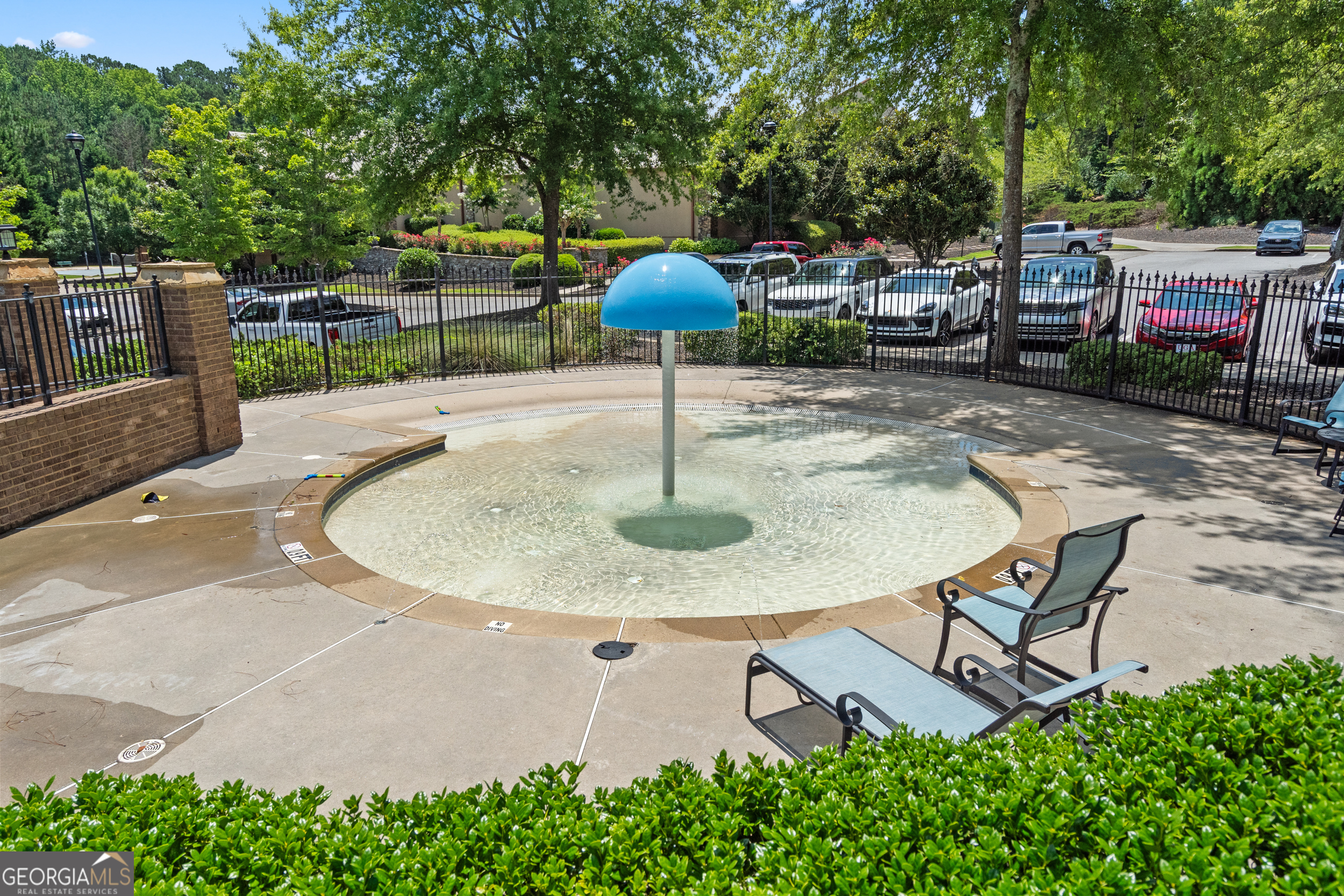 2045 Kent Court Milton, GA 30004 - Photo 86 of 104 a backyard of a house with table and chairs