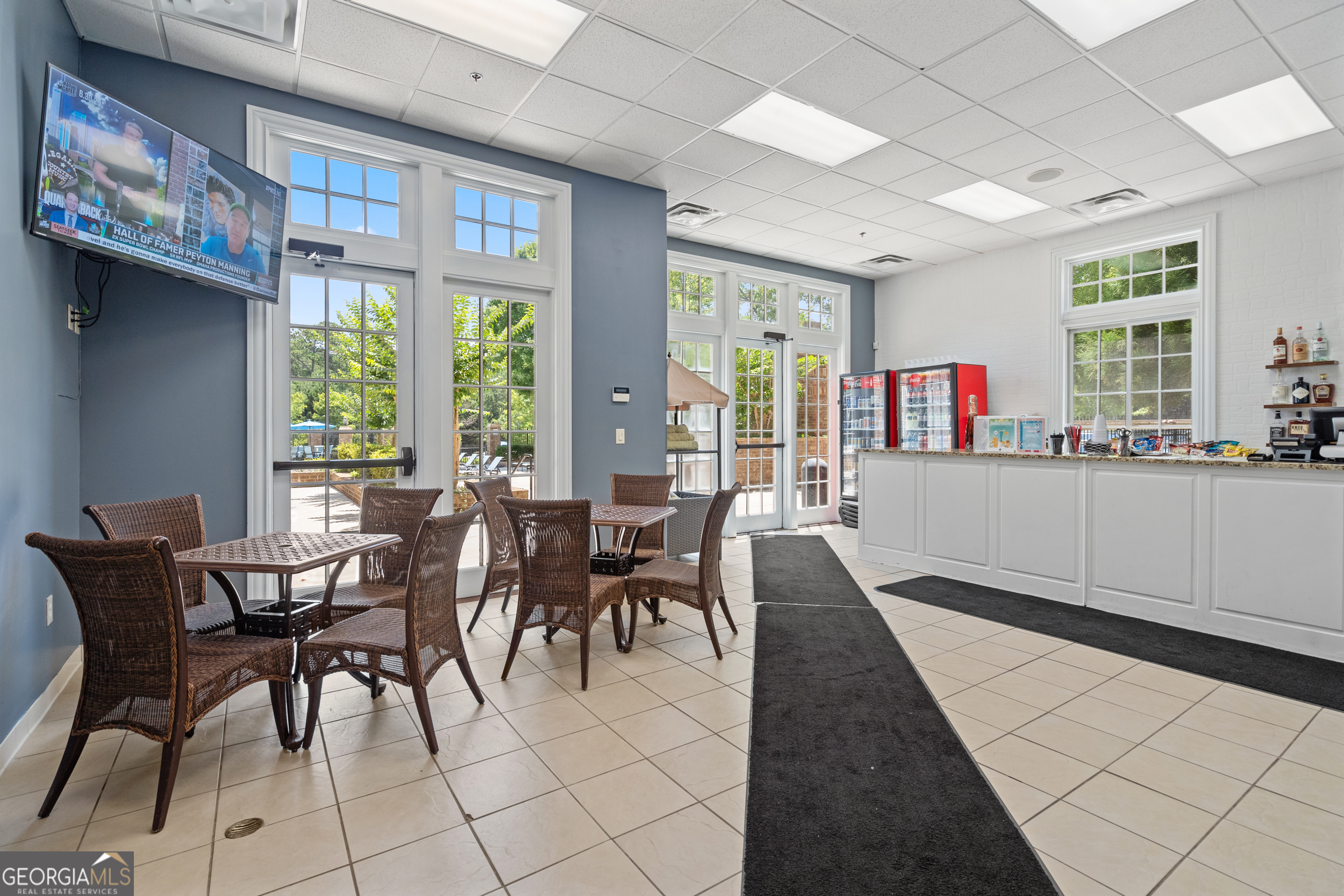 2045 Kent Court Milton, GA 30004 - Photo 89 of 104 a dining room with furniture and a floor to ceiling window