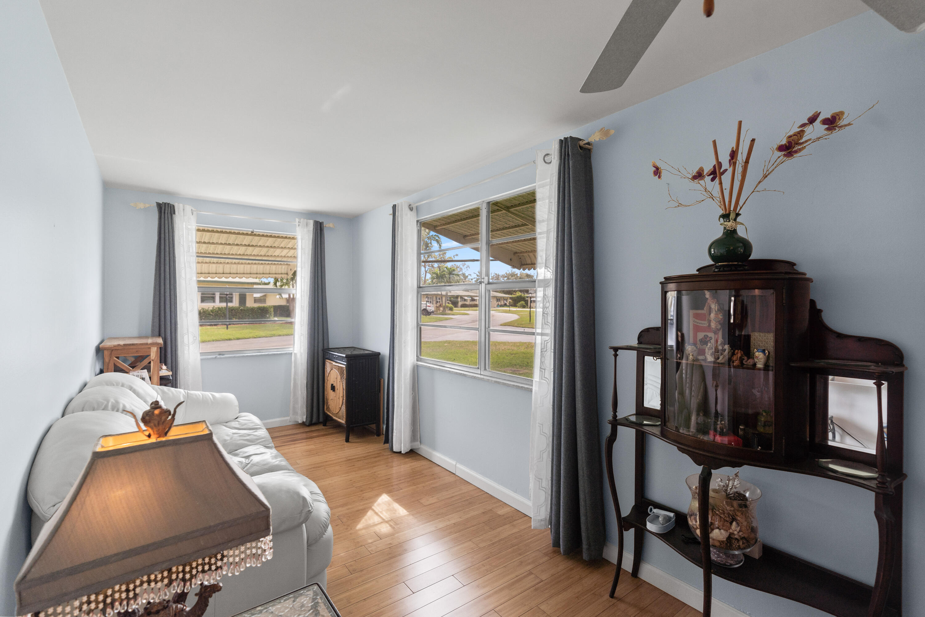 249 Cardinal Lane Delray Beach, FL 33445 - Photo 23 of 36 a bedroom with furniture and a window