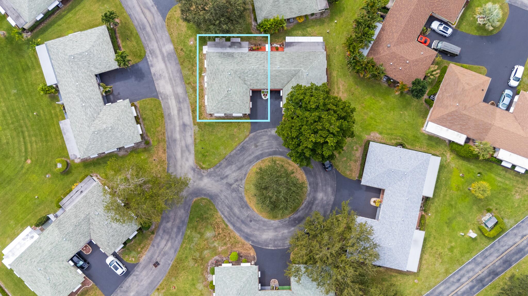 249 Cardinal Lane Delray Beach, FL 33445 - Photo 29 of 36 an aerial view of a house with outdoor swimming pool