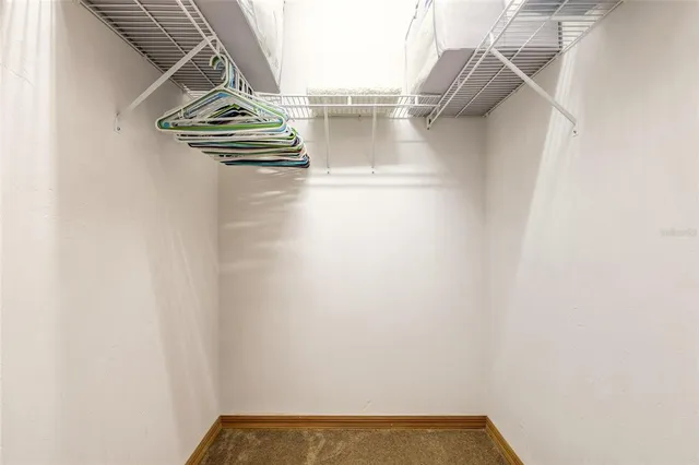 a view of small space with racks on the wall