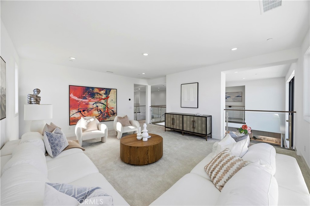 20138 Marlow Lane Porter Ranch, CA 91326 - Photo 17 of 39 a bedroom with furniture and a couch