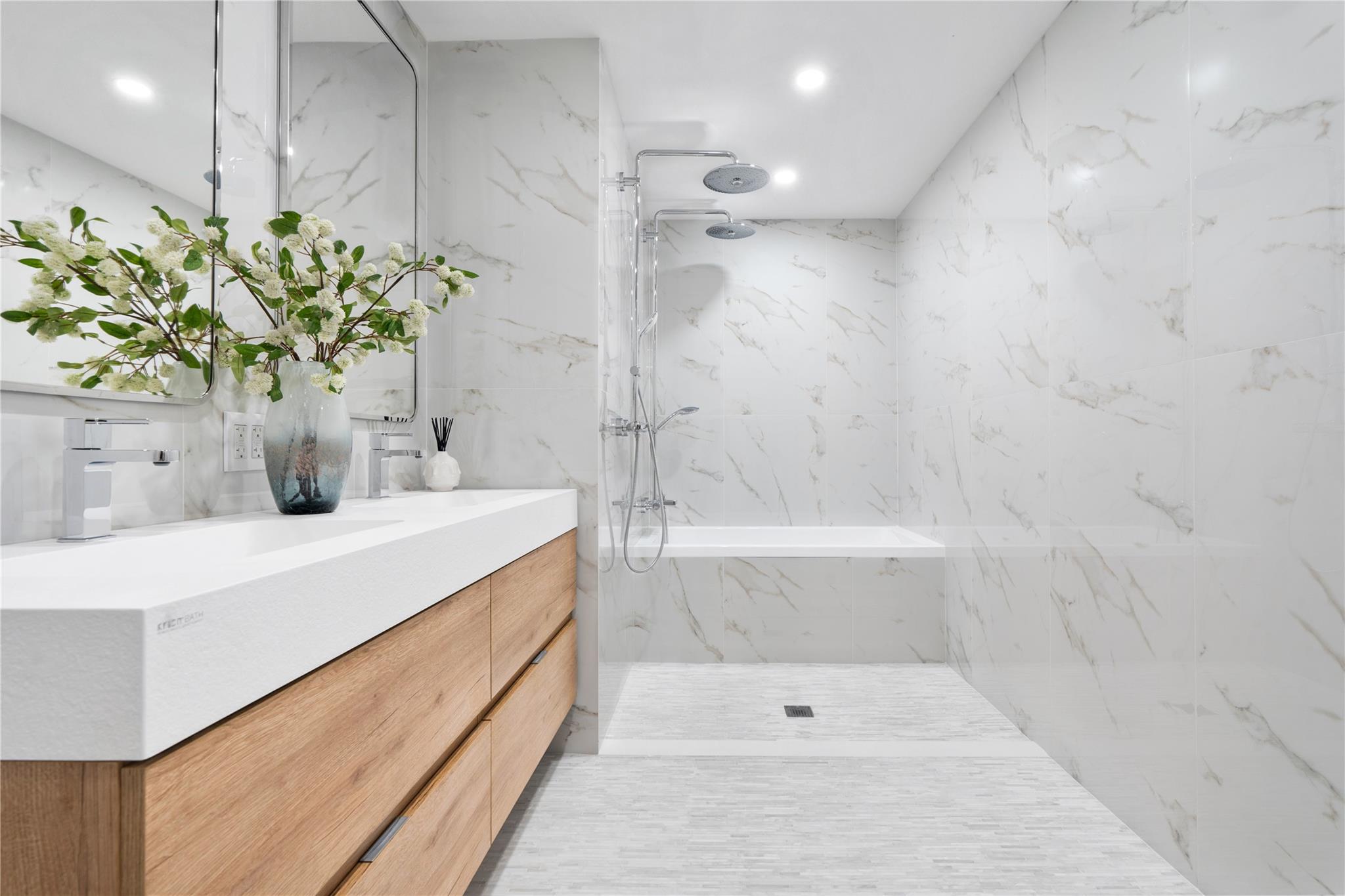 78-29 Austin Street, Unit PH1C Queens, NY 11375 - Photo 14 of 27 a bathroom with a sink a faucet a potted plant and a shower