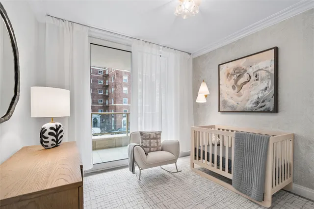 a bedroom with furniture and a window