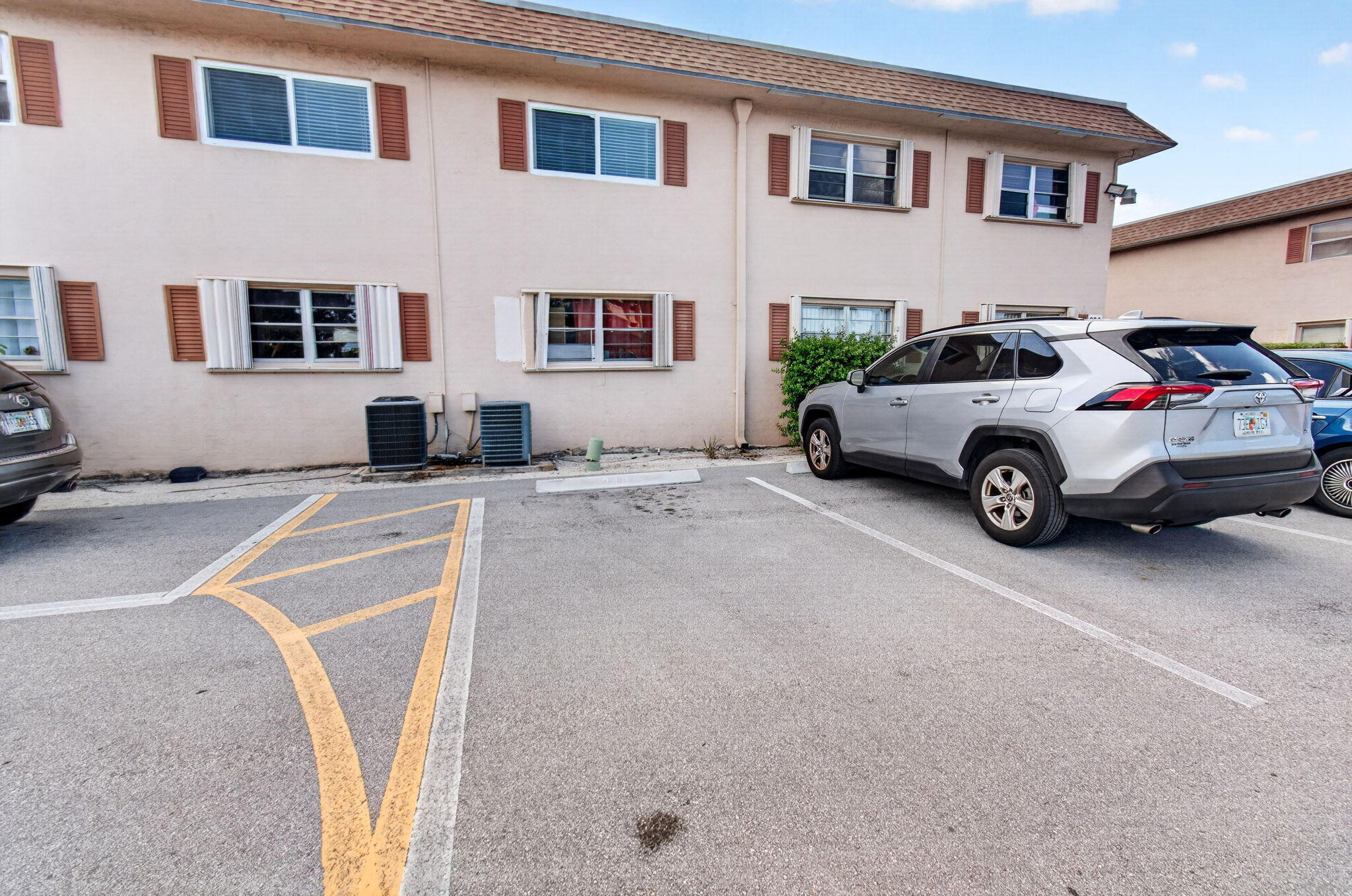 600 Southwest 2nd Avenue, Unit 240 Boca Raton, FL 33432 - Photo 45 of 54 a car parked in front of a house