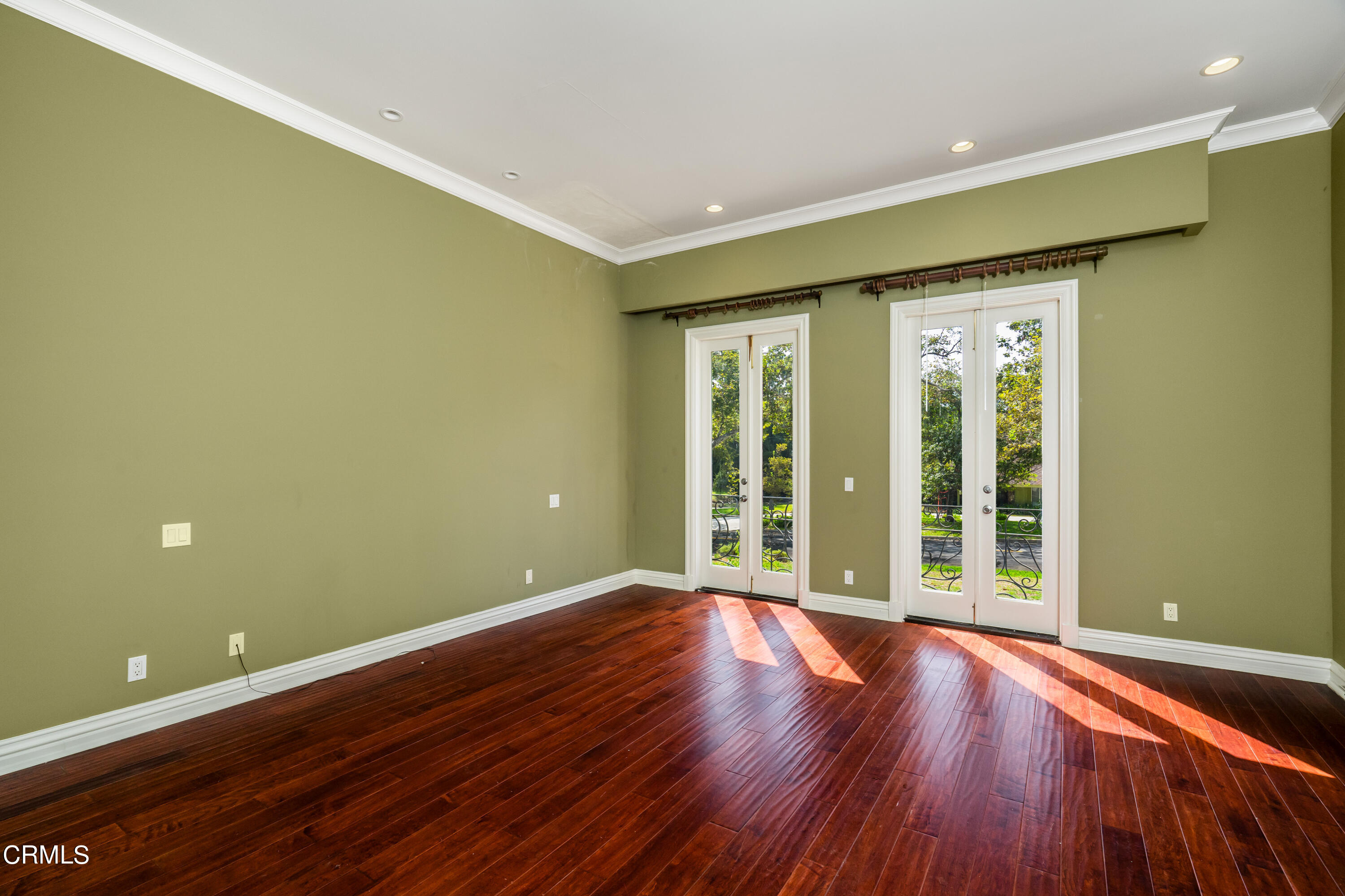 1165 Arden Road Pasadena, CA 91106 - Photo 11 of 25 a view of an empty room with wooden floor and a window