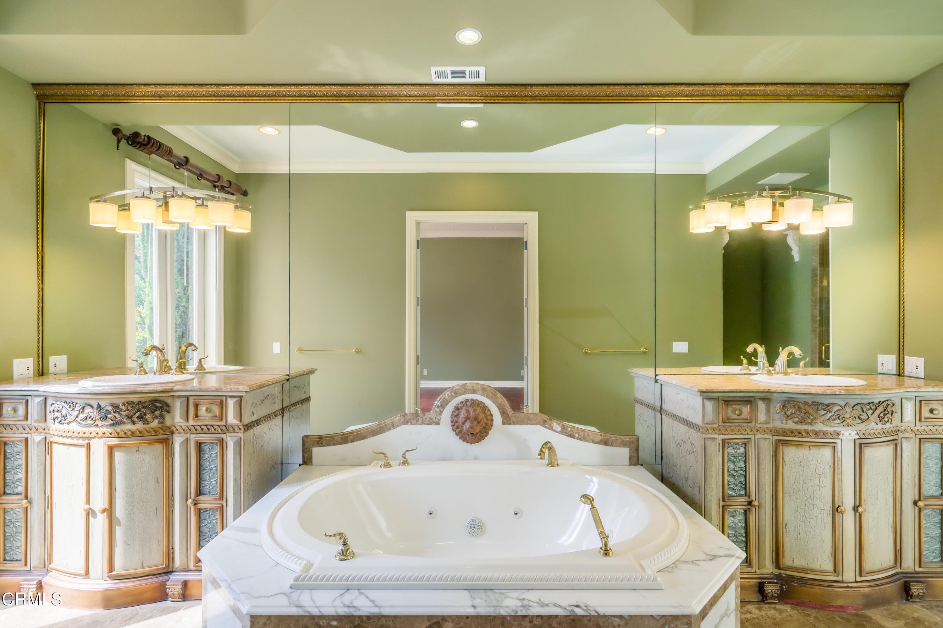 1165 Arden Road Pasadena, CA 91106 - Photo 12 of 25 a bathroom with a tub sink and mirror