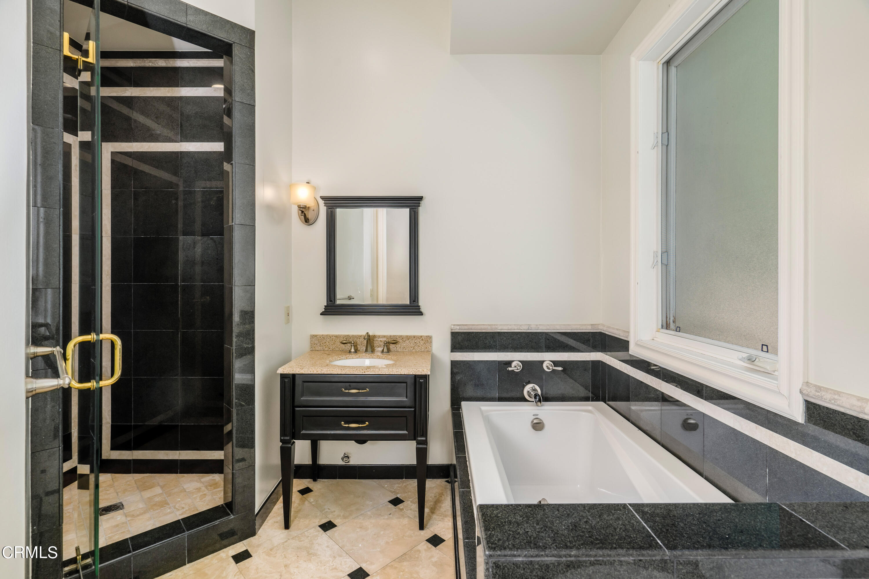 1165 Arden Road Pasadena, CA 91106 - Photo 16 of 25 a bathroom with a bathtub and a sink