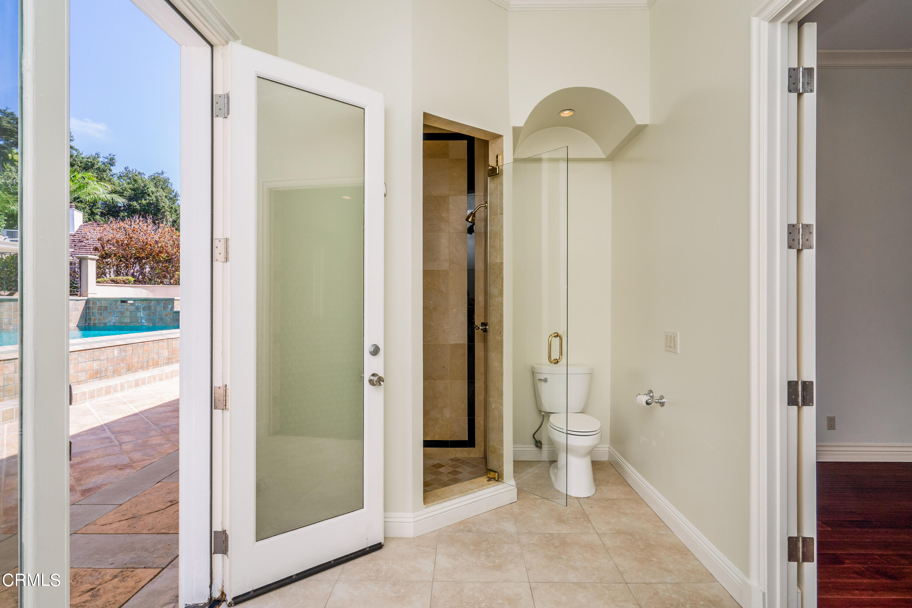 1165 Arden Road Pasadena, CA 91106 - Photo 19 of 25 a bathroom with a toilet and a shower