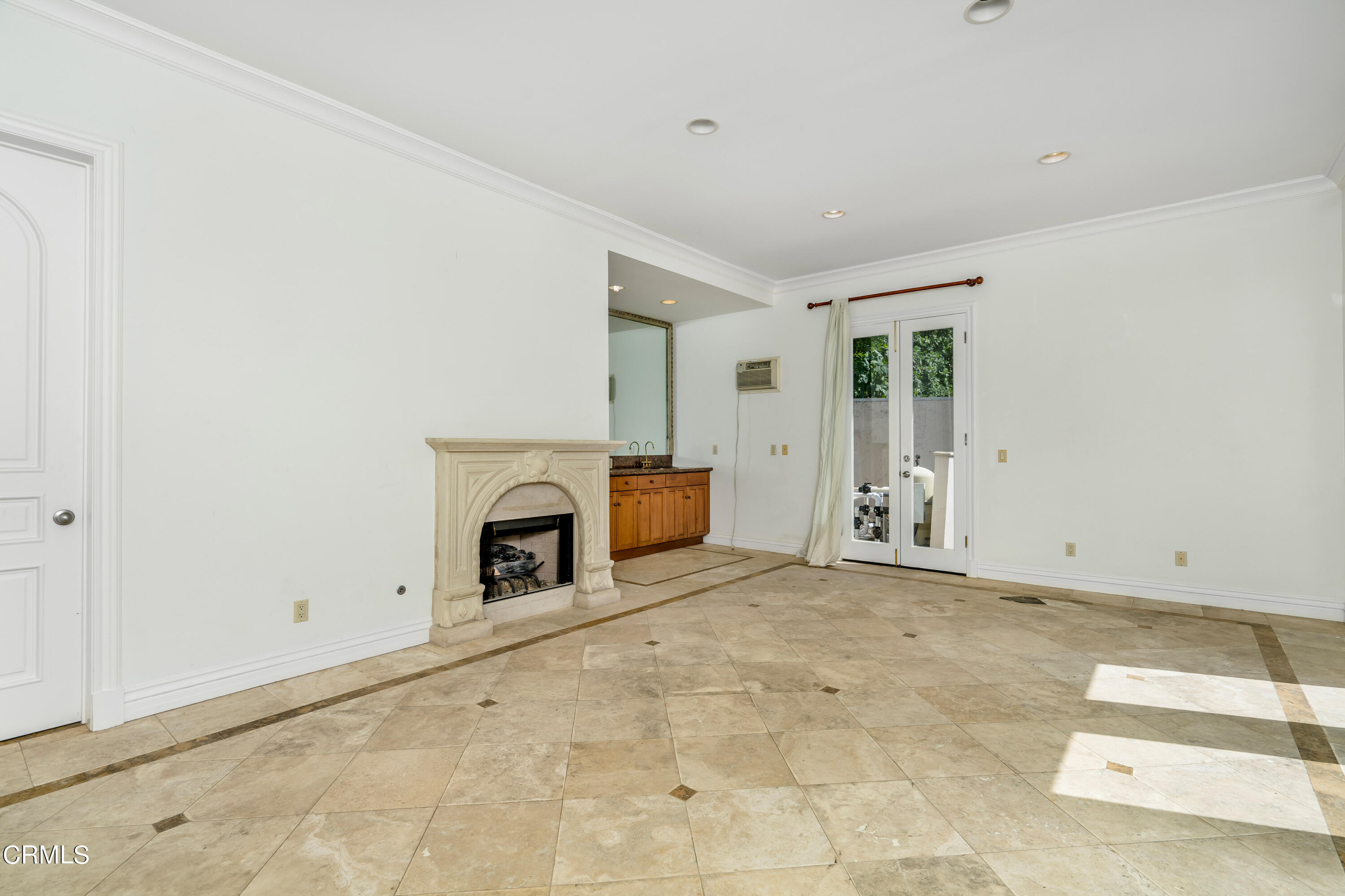 1165 Arden Road Pasadena, CA 91106 - Photo 24 of 25 a view of empty room with a fireplace