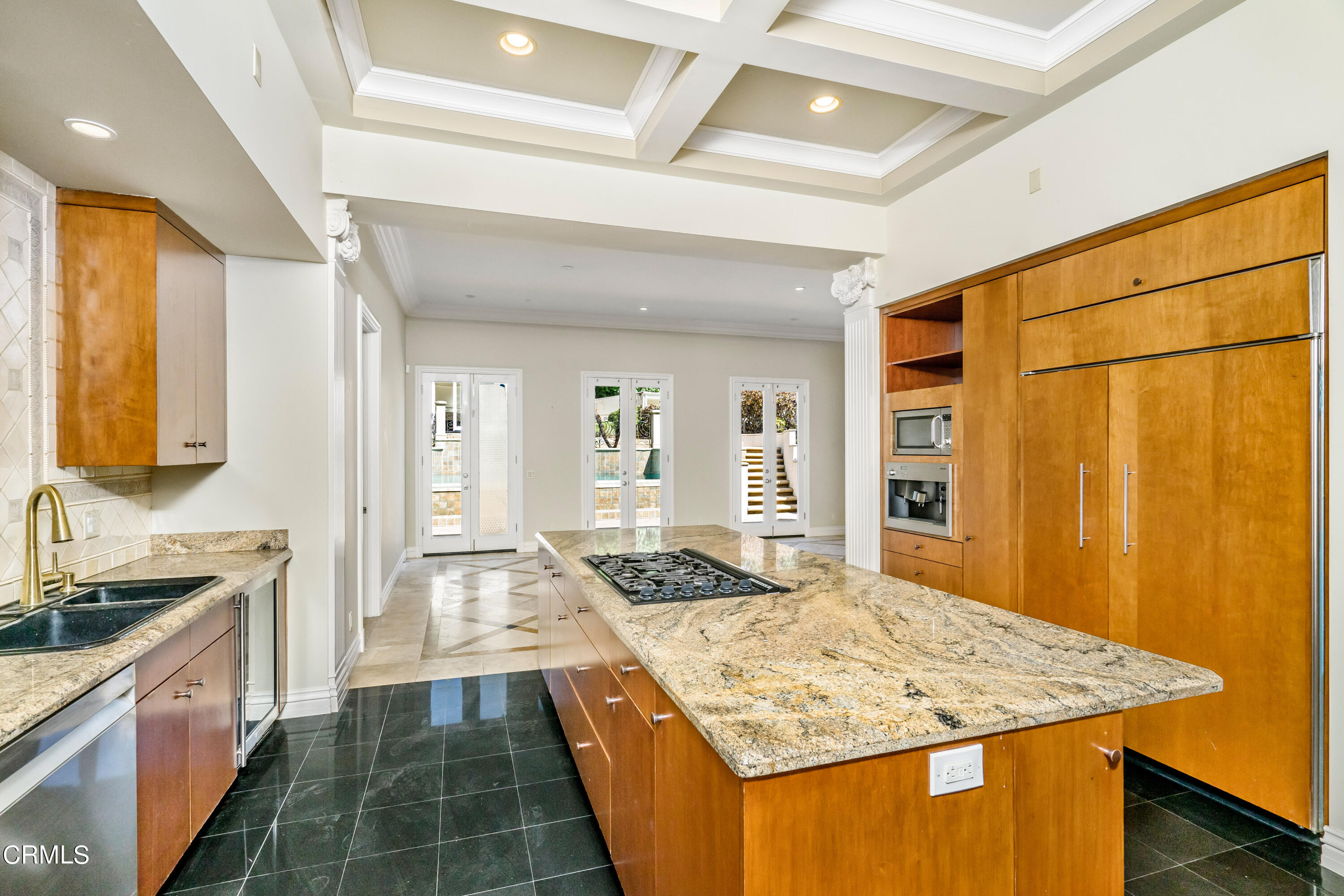 1165 Arden Road Pasadena, CA 91106 - Photo 3 of 25 a kitchen with stainless steel appliances granite countertop a sink stove and cabinets