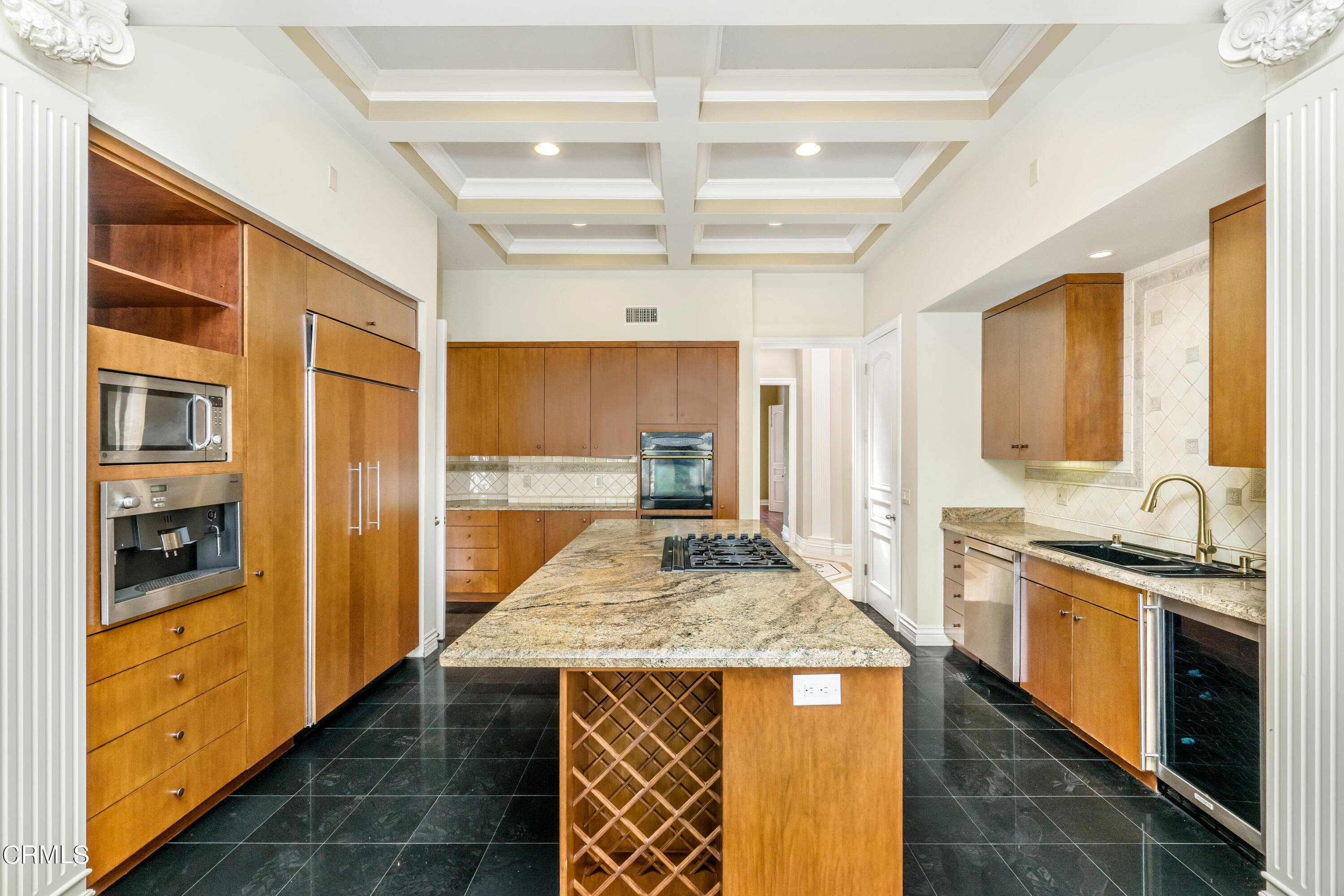 1165 Arden Road Pasadena, CA 91106 - Photo 4 of 25 a kitchen with stainless steel appliances granite countertop a stove and a refrigerator