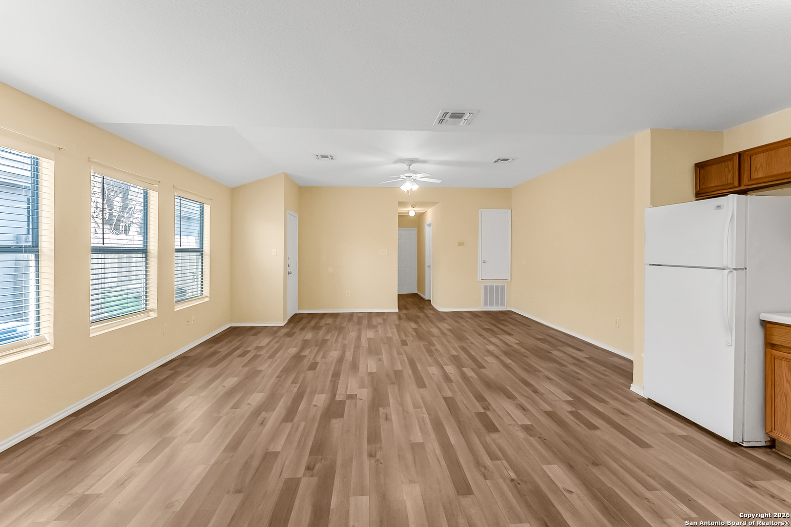 3812 Maverick Crk Road San Antonio, TX 78247 - Photo 12 of 24 a view of empty room with wooden floor and fan