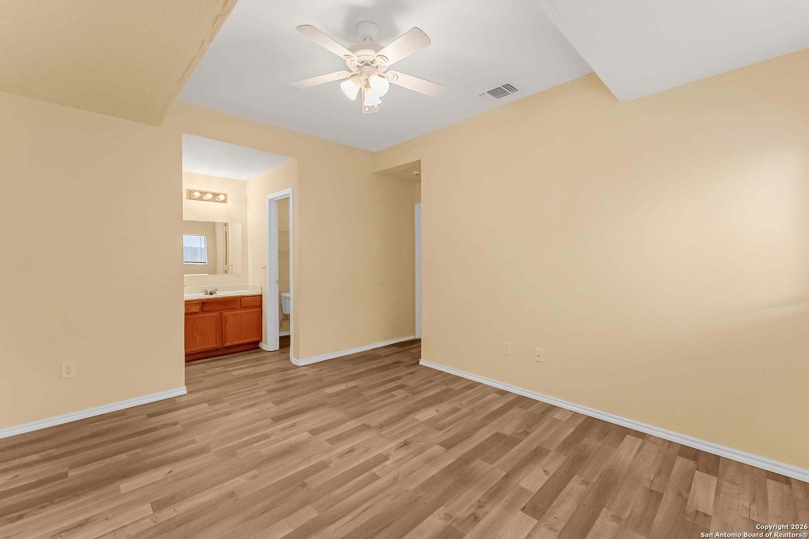 3812 Maverick Crk Road San Antonio, TX 78247 - Photo 19 of 24 wooden floor in an empty room with a window