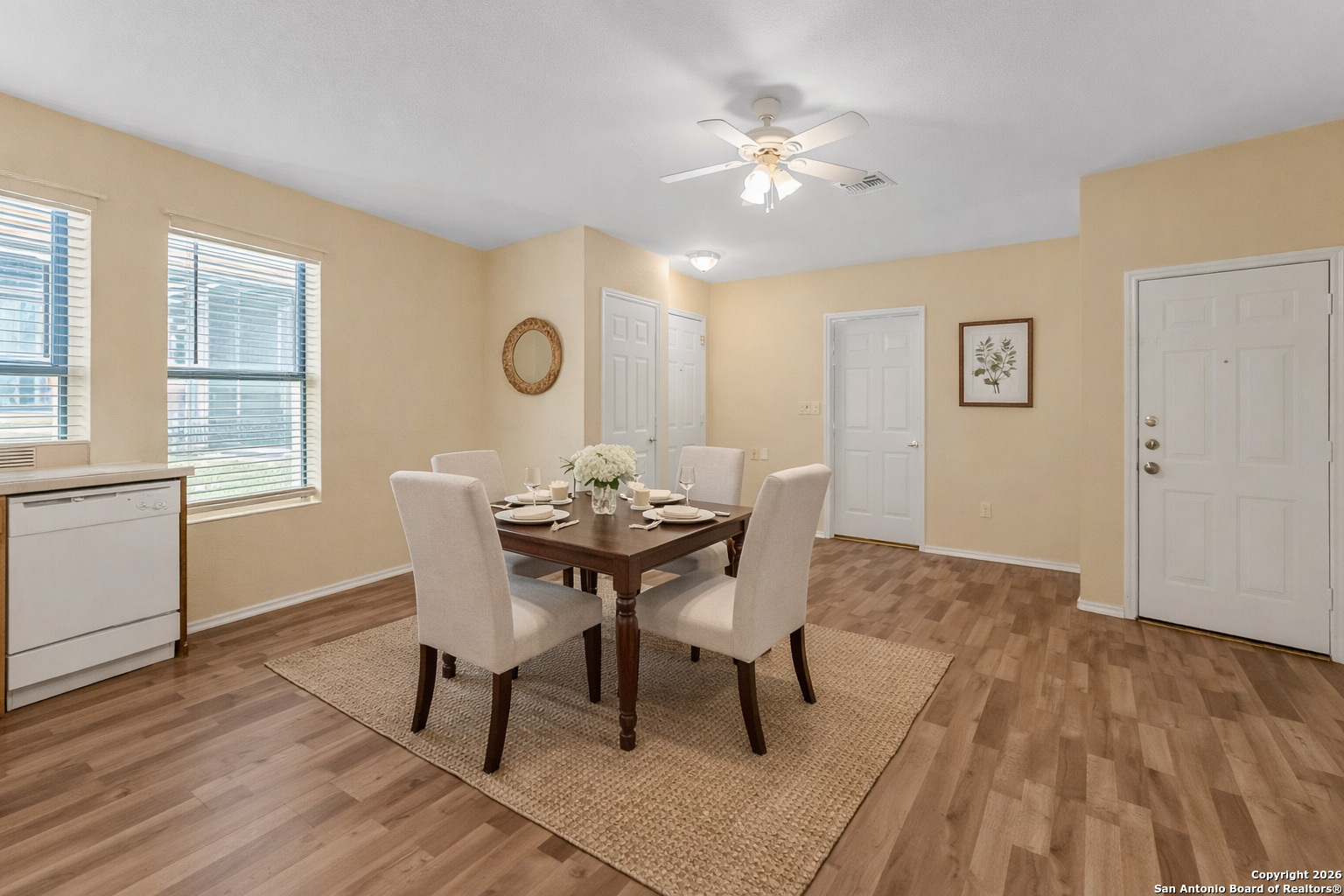 3812 Maverick Crk Road San Antonio, TX 78247 - Photo 5 of 24 a view of a dining room with furniture and wooden floor