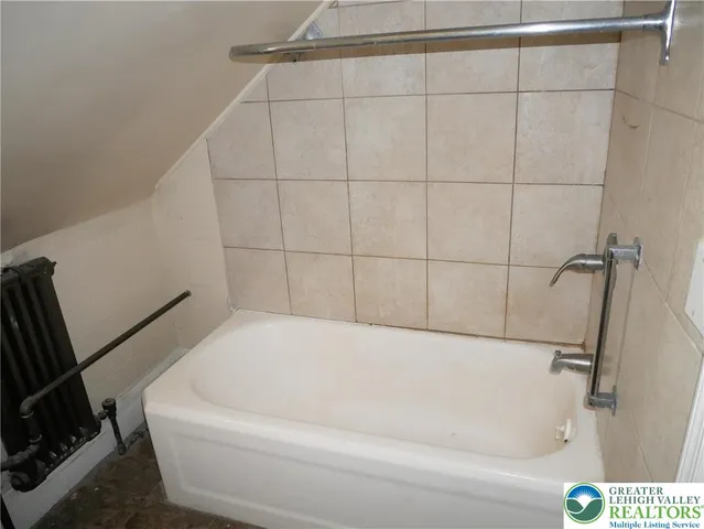 a bathroom with a bathtub
