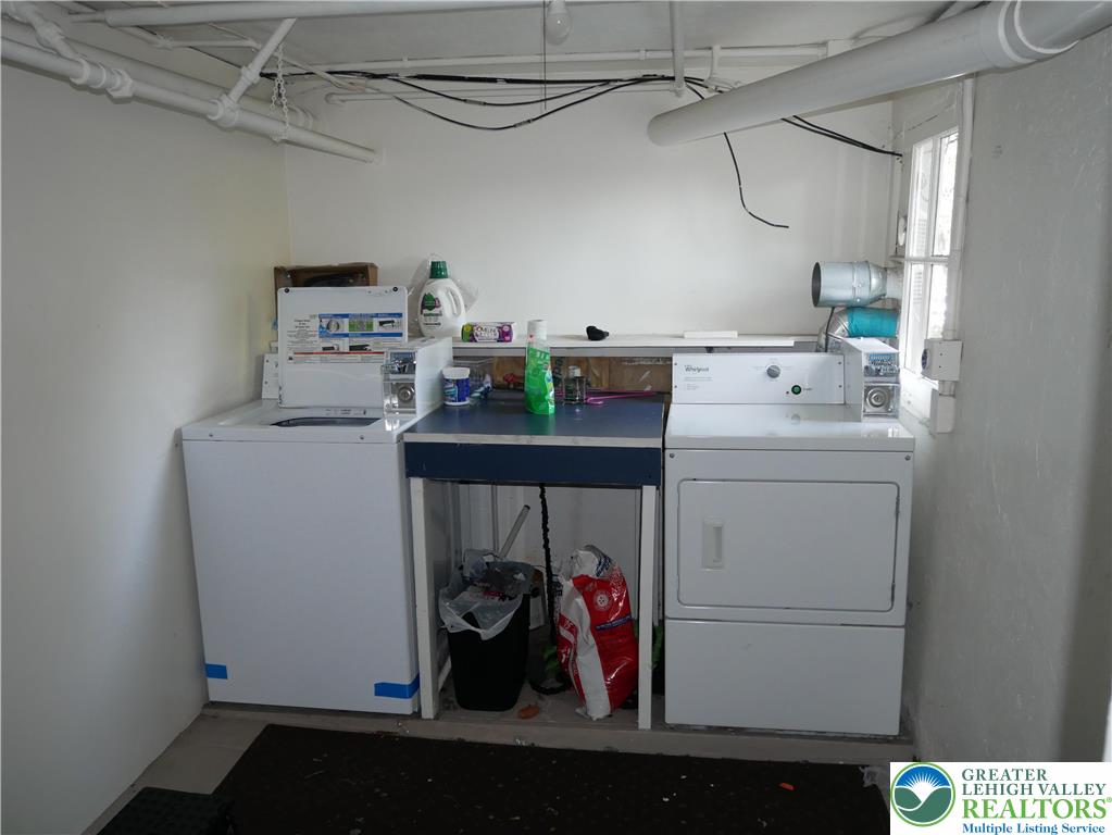 2110 Walnut Street, Unit E Allentown, PA 18104 - Photo 18 of 18 a utility room with dryer and washer