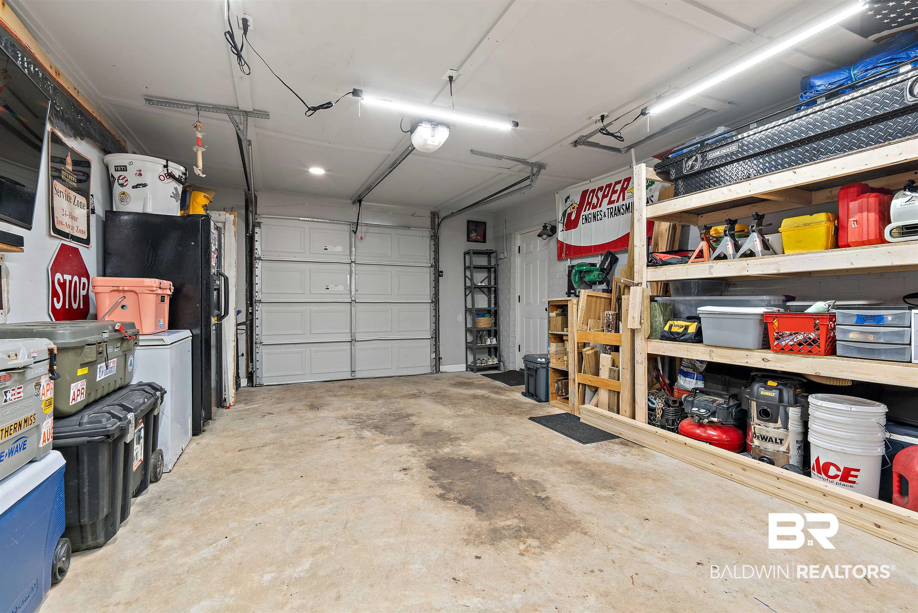 4682 Opal Drive Mobile, AL 36619 - Photo 24 of 27 Garage featuring black refrigerator