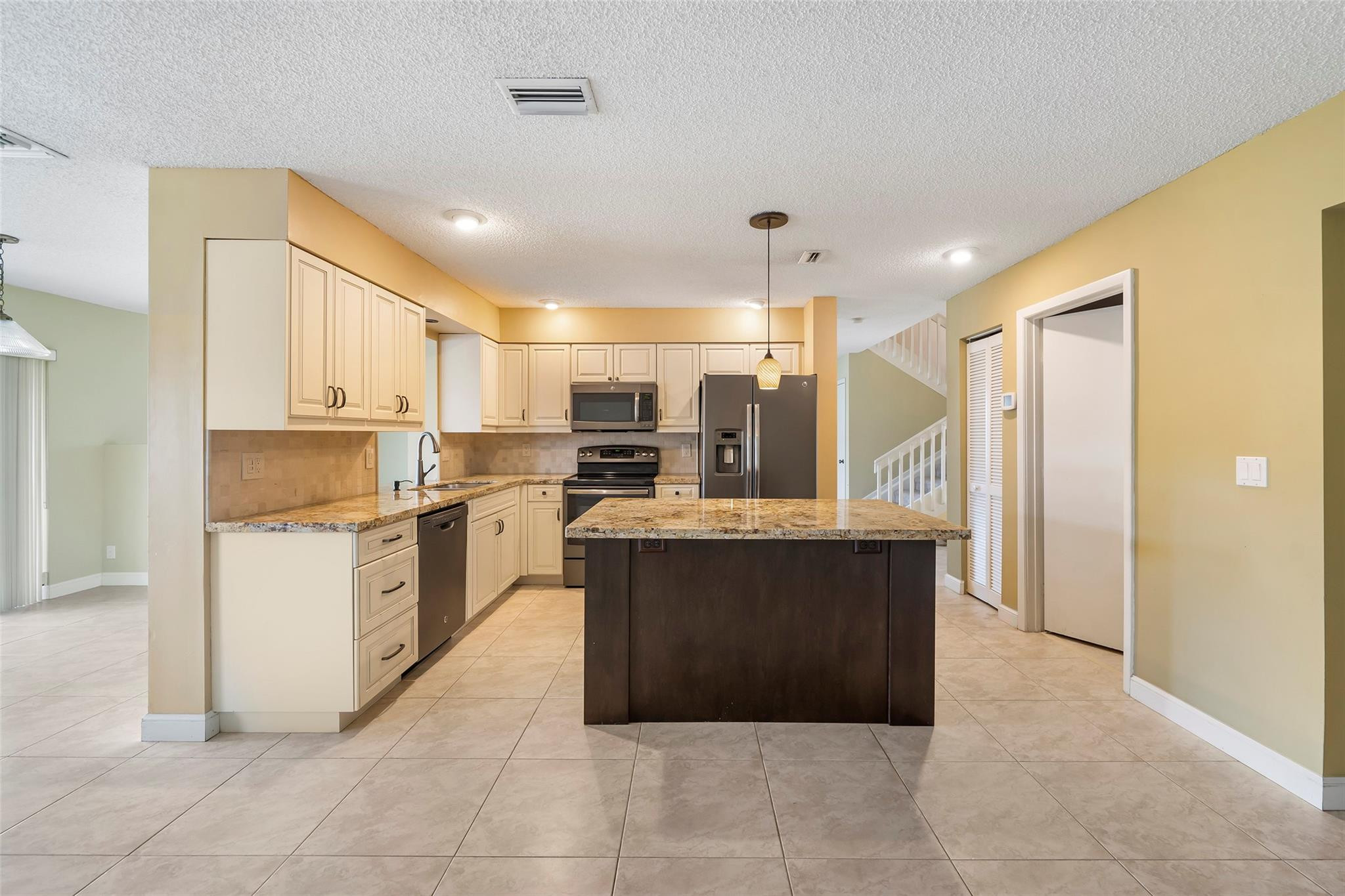 10423 Boca Springs Drive Boca Raton, FL 33428 - Photo 3 of 64 a large kitchen with a cabinets and counter space