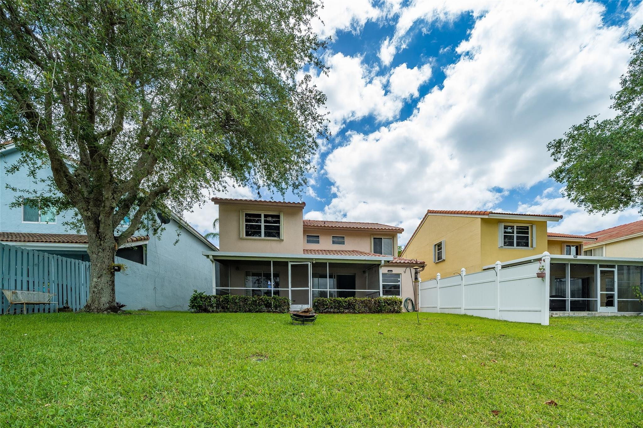 10423 Boca Springs Drive Boca Raton, FL 33428 - Photo 45 of 64 a view of a house with backyard and a tree