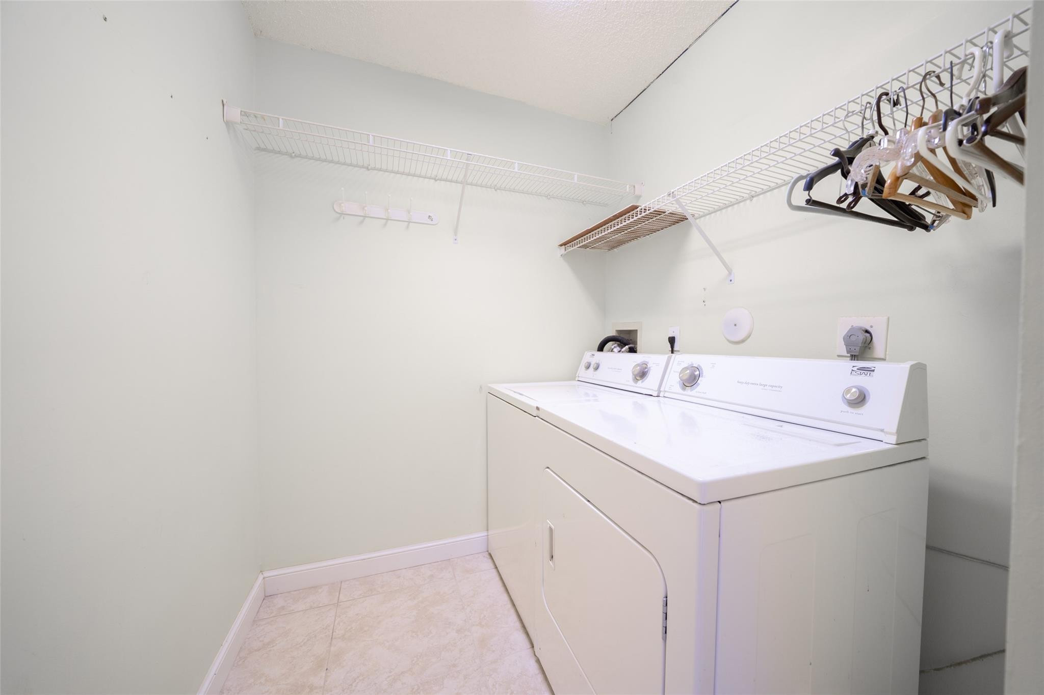 10423 Boca Springs Drive Boca Raton, FL 33428 - Photo 51 of 64 a utility room with dryer and washer