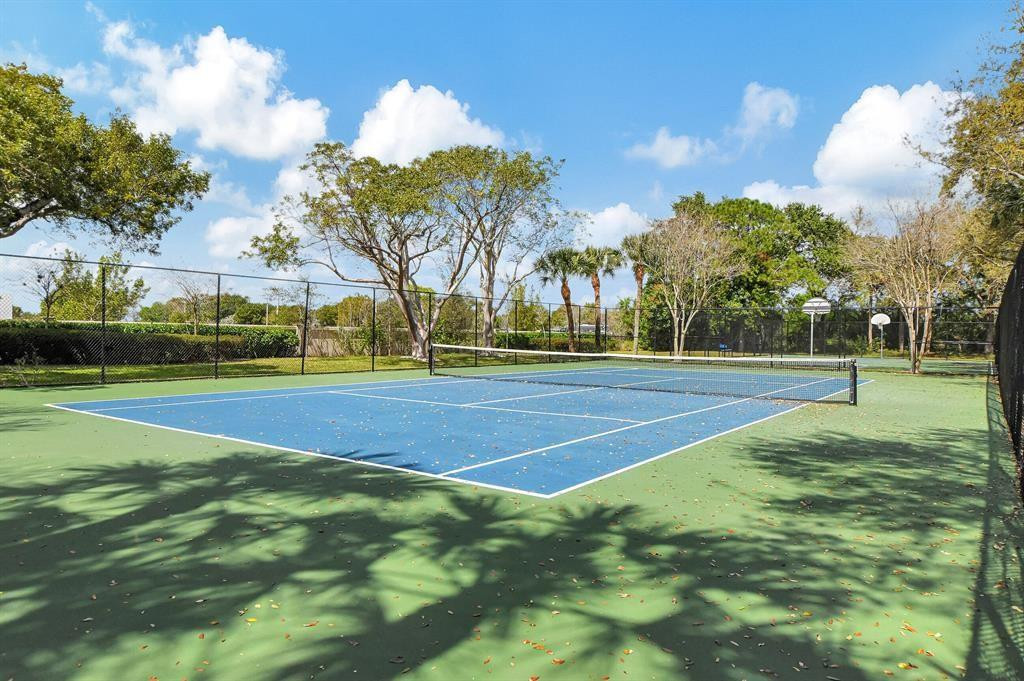 10423 Boca Springs Drive Boca Raton, FL 33428 - Photo 53 of 64 a view of a tennis ground