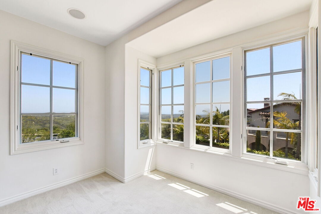 24 Still Water Newport Coast, CA 92657 - Photo 31 of 56 an empty room with windows
