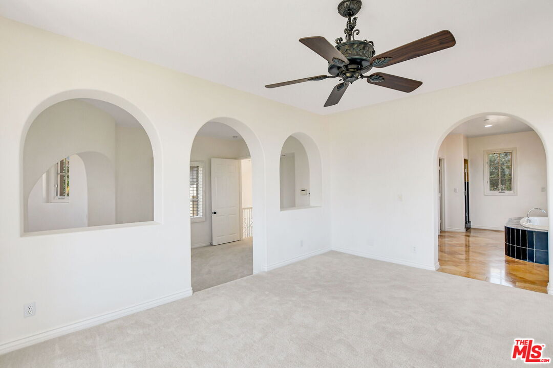 24 Still Water Newport Coast, CA 92657 - Photo 34 of 56 a view of a livingroom with a ceiling fan