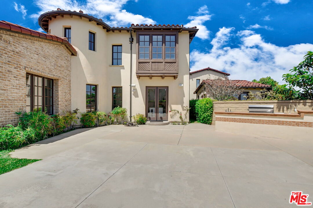 24 Still Water Newport Coast, CA 92657 - Photo 51 of 56 front view of a house with a street