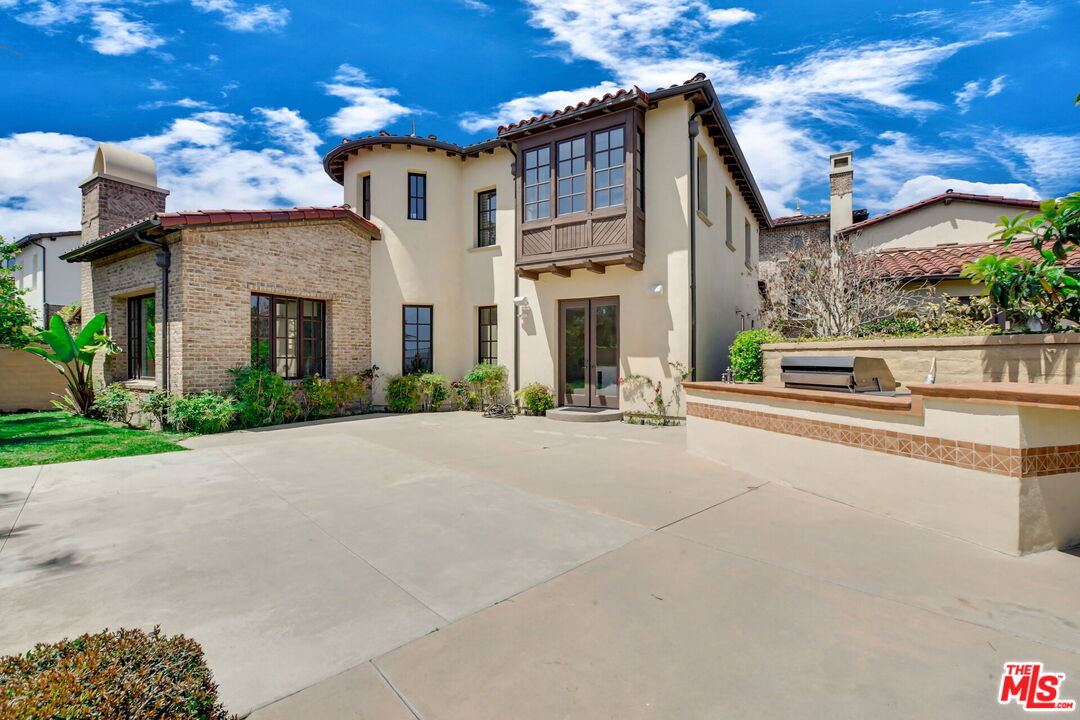 24 Still Water Newport Coast, CA 92657 - Photo 52 of 56 a front view of a house with a yard