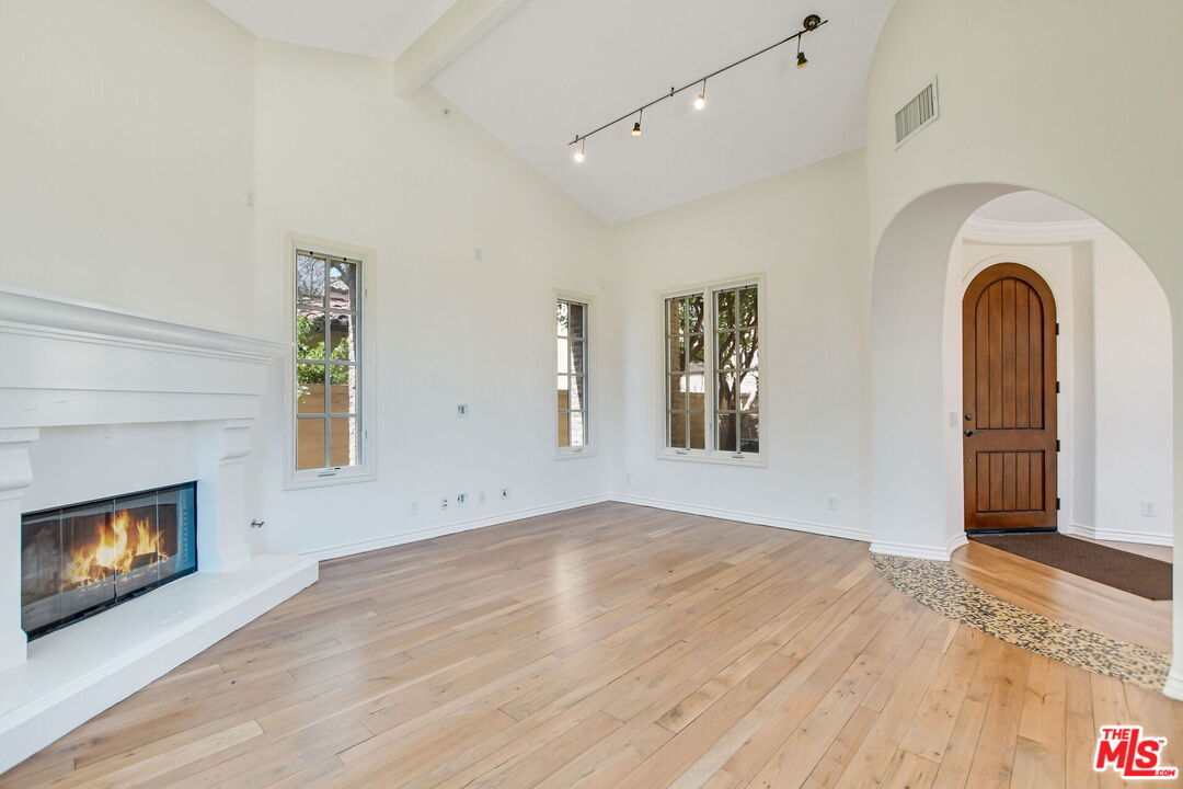 24 Still Water Newport Coast, CA 92657 - Photo 9 of 56 a view of empty room with window and fireplace