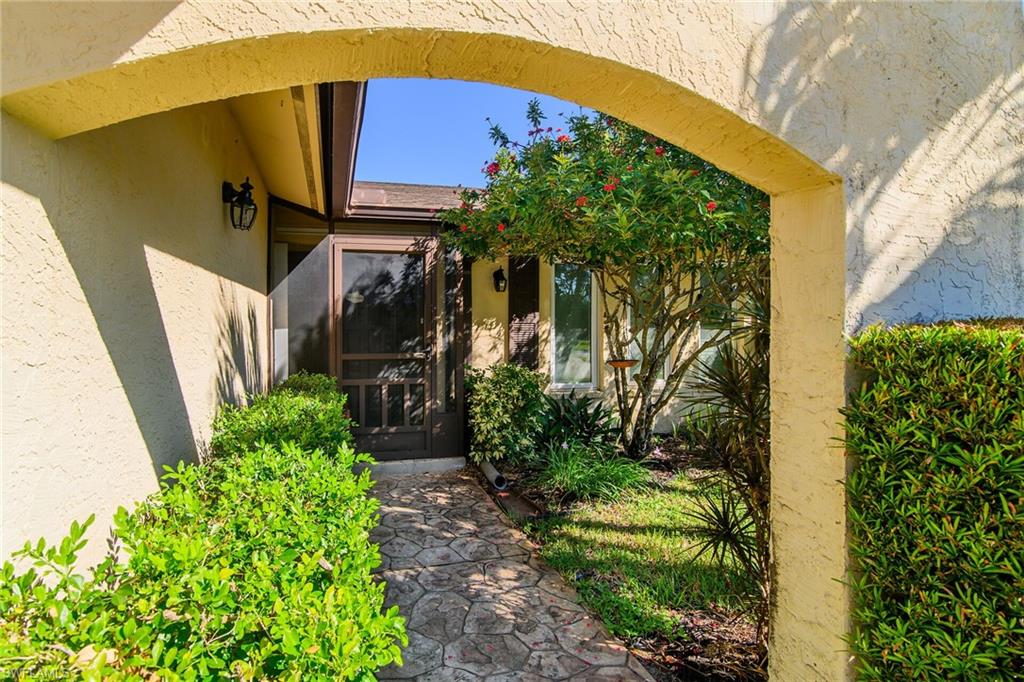 1337 Wisconsin Drive Naples, FL 34103 - Photo 3 of 35 a view of a backyard