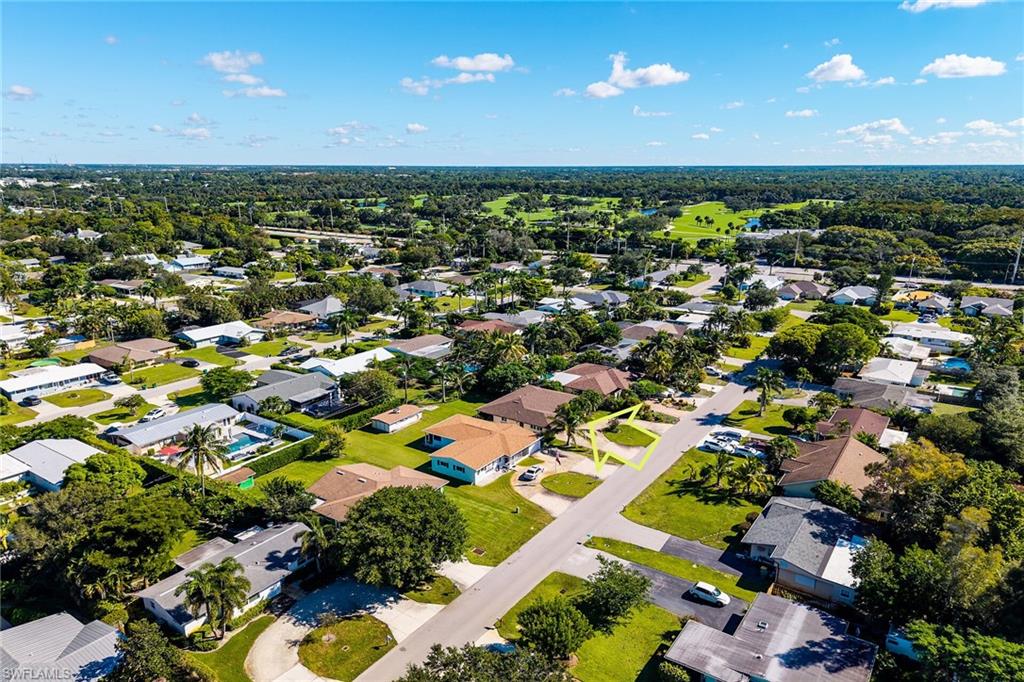 1337 Wisconsin Drive Naples, FL 34103 - Photo 33 of 35 an aerial view of a city